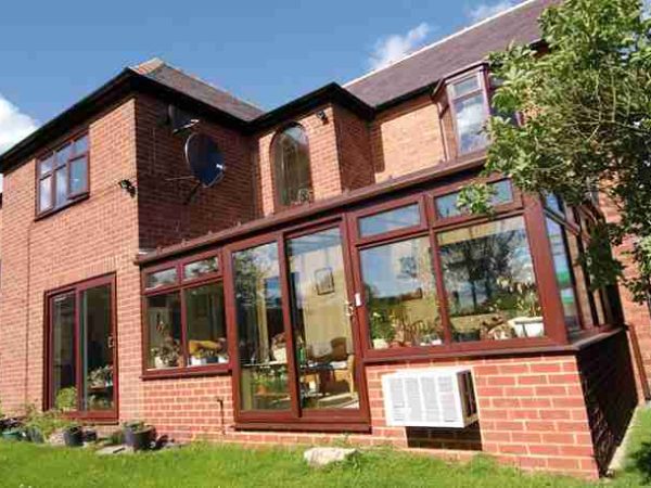 uPVC Doors Prices home has rosewood conservatory windows and doors