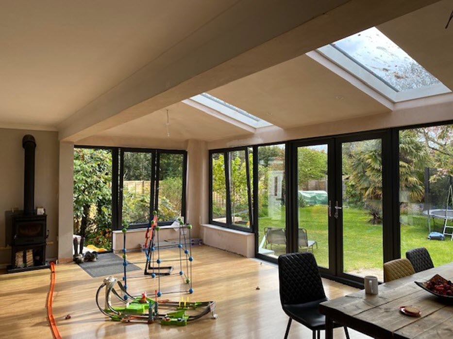 Conservatory with roof lights and tilt and turn windows