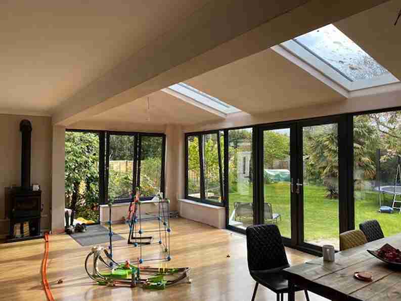 Conservatory with roof lights and tilt and turn windows