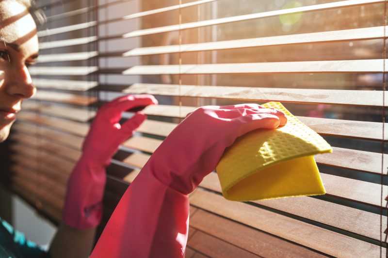 how to clean blinds - sponge on blinds