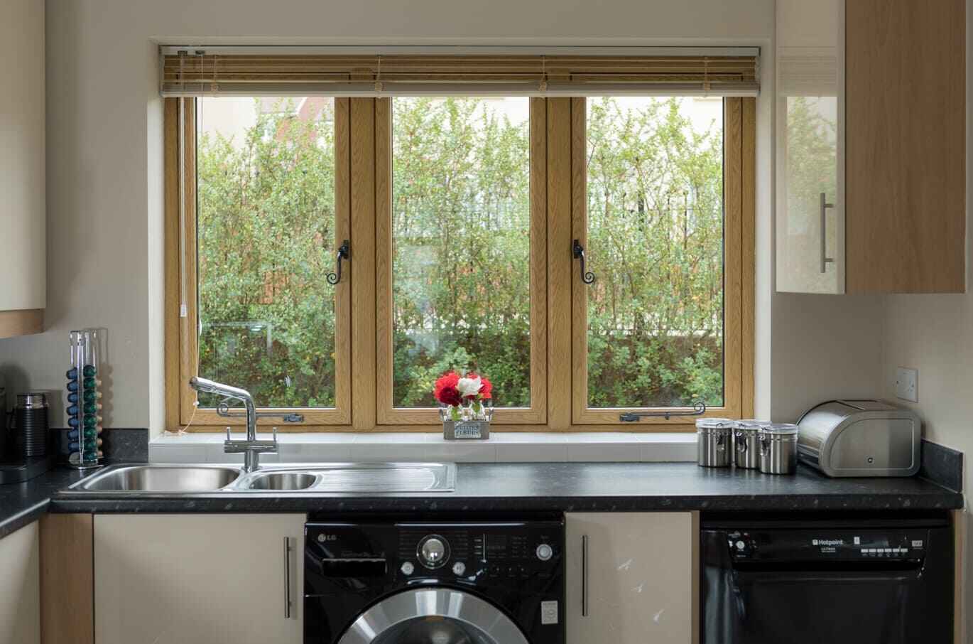 interior mechanical flush sash window in upvc material with woodgrain finish